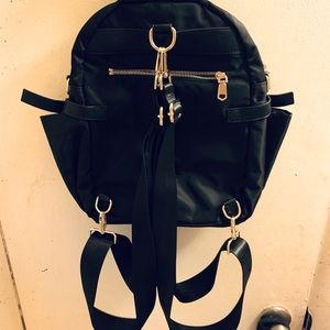 I have too many backpack purses